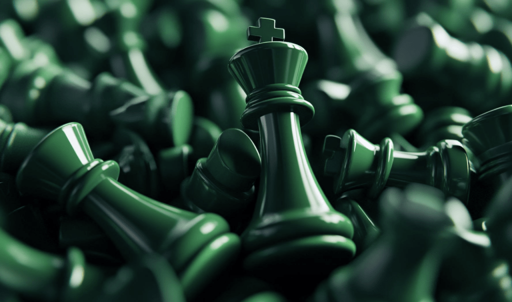 A close-up of a shiny green chess king surrounded by numerous green pawns, creating a rich, textured background.