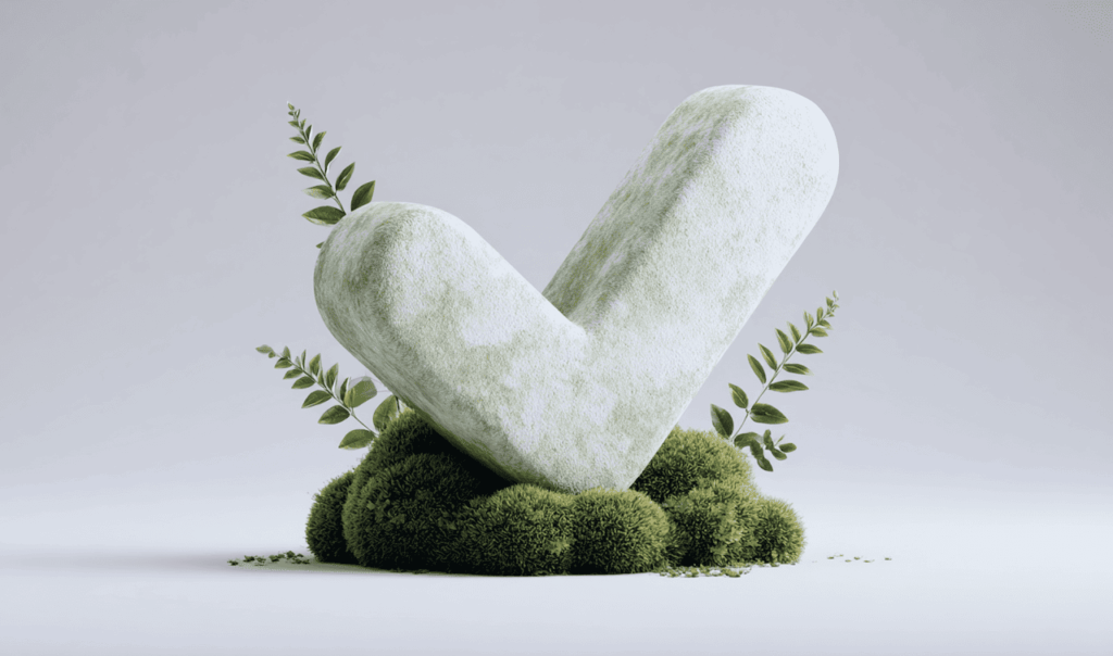 Large textured checkmark symbol covered in moss and surrounded by small leafy plants on a light gray background.