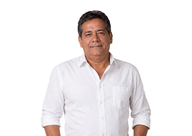 A man in a shirt is looking straight ahead